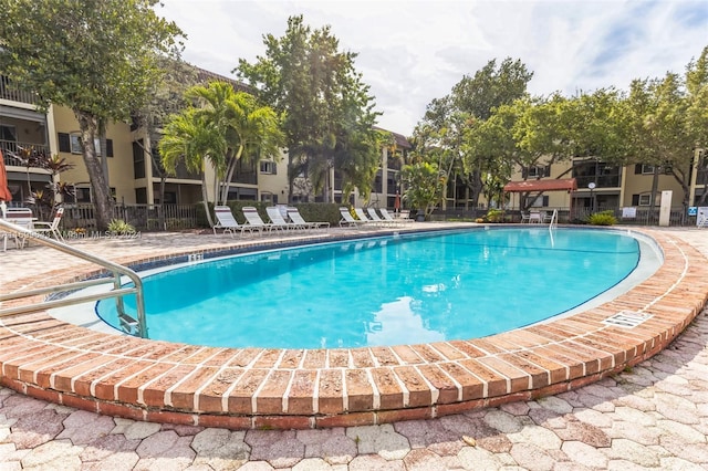 view of pool featuring a patio area