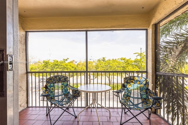 unfurnished sunroom featuring a healthy amount of sunlight