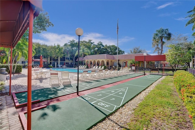 view of property's community with a pool