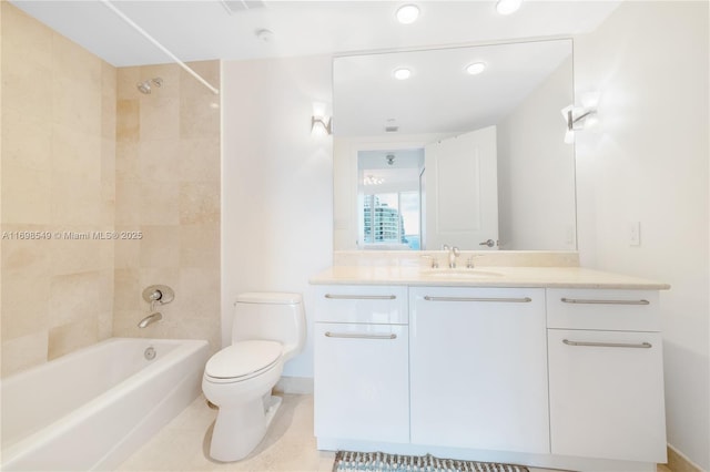 full bath with shower / bathing tub combination, toilet, vanity, tile patterned flooring, and baseboards