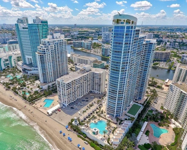 aerial view with a view of city, a beach view, and a water view