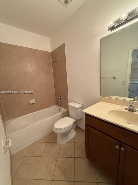 full bath featuring vanity, tile patterned floors, toilet, and  shower combination