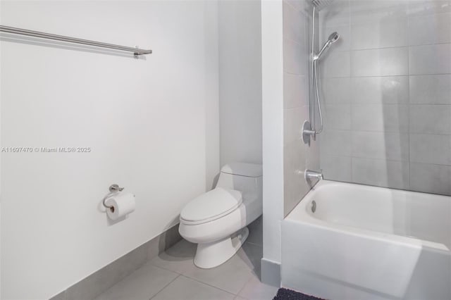 bathroom with toilet, tile patterned flooring, and shower / bathing tub combination