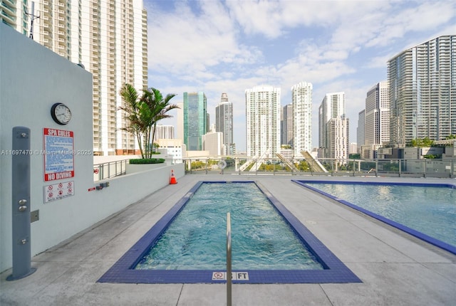 pool featuring a city view