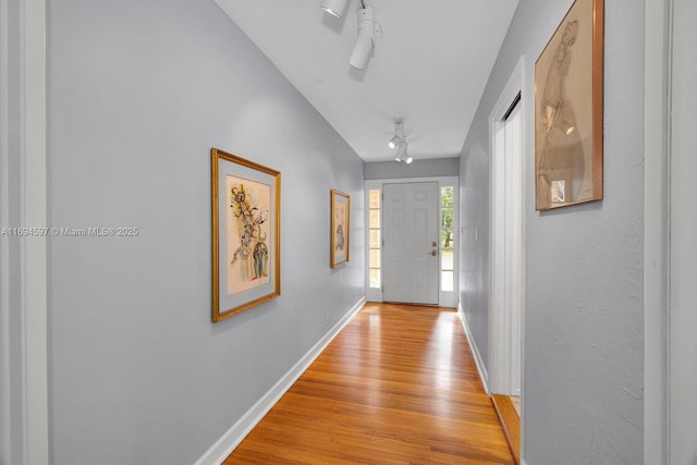 6065 SW 133rd St, Pinecrest, FL 33156 - living area with french doors, a premium fireplace, light wood-style floors, and baseboards