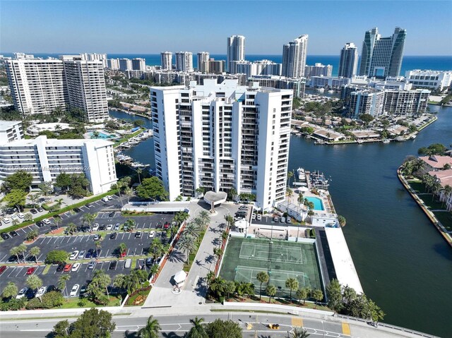 birds eye view of property featuring a water view