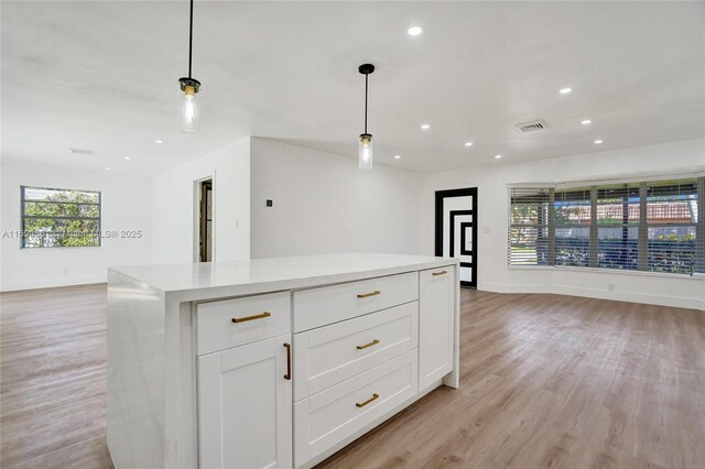 full bathroom with tile patterned flooring, tiled shower / bath combo, toilet, and vanity