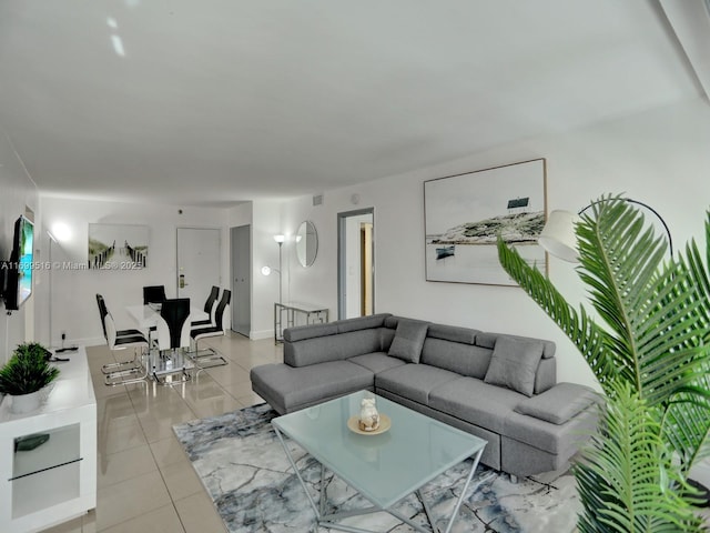 living room featuring light tile patterned flooring