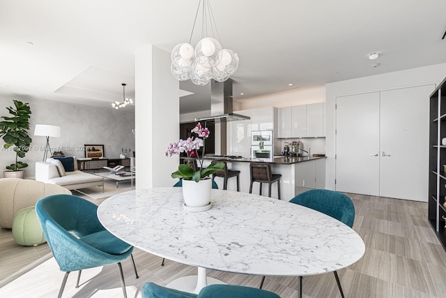 dining space with a notable chandelier