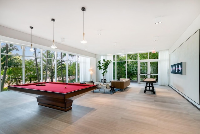 rec room with floor to ceiling windows and billiards