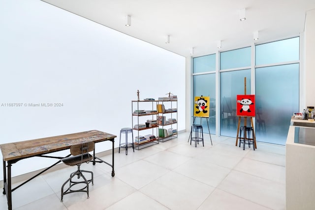 interior space featuring floor to ceiling windows and a wealth of natural light