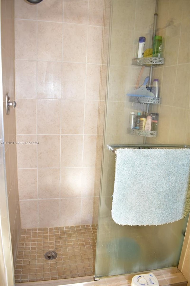 bedroom with light tile patterned floors