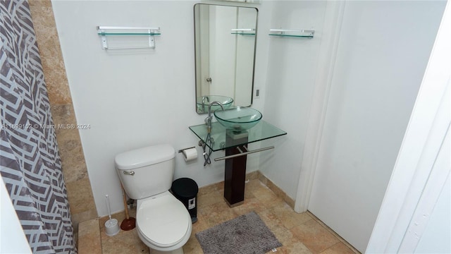 350 S Miami Ave Unit 2905, Miami, FL 33130 - bathroom featuring toilet and curtained shower