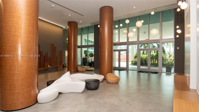 350 S Miami Ave Unit 2905, Miami, FL 33130 - lobby featuring a towering ceiling and expansive windows