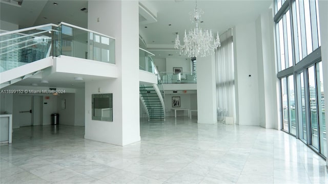 350 S Miami Ave Unit 2905, Miami, FL 33130 - lobby with a towering ceiling and stairway