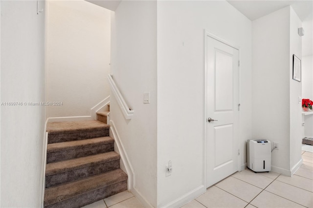 bedroom with light carpet