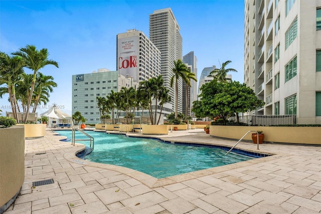 view of pool featuring a patio area