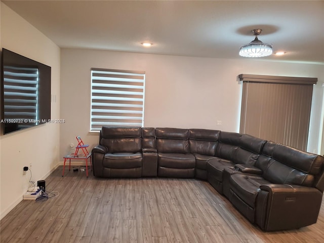 living room with light hardwood / wood-style flooring