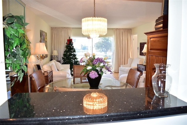 dining area with a notable chandelier