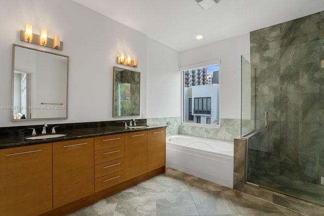 315 NE 7th St, Fort Lauderdale, FL 33304 - bathroom with a garden tub, a stall shower, and double vanity