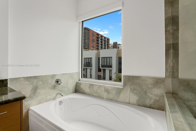 315 NE 7th St, Fort Lauderdale, FL 33304 - full bath featuring a garden tub and vanity