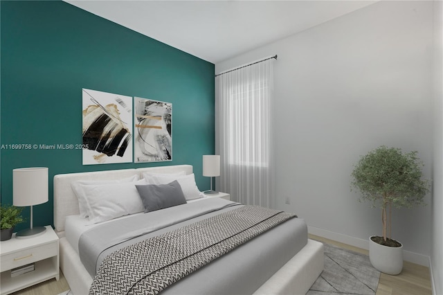 bedroom featuring light hardwood / wood-style floors