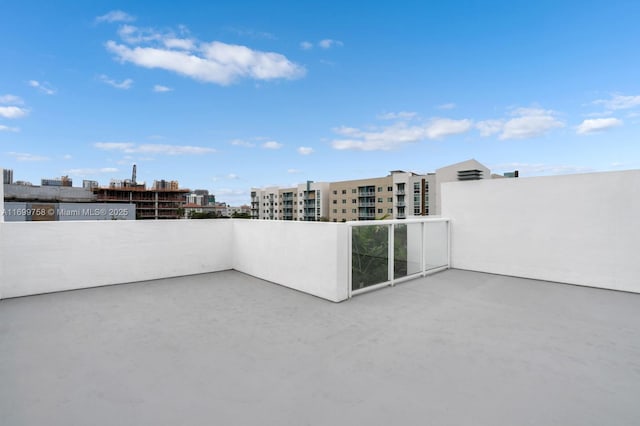 view of patio / terrace with a balcony