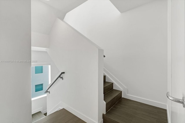 315 NE 7th St, Fort Lauderdale, FL 33304 - staircase featuring baseboards and wood finished floors