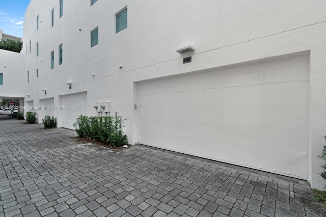 315 NE 7th St, Fort Lauderdale, FL 33304 - garage featuring decorative driveway