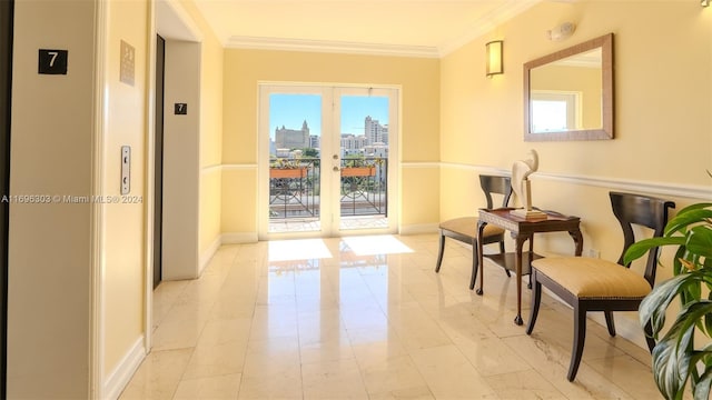 hall with french doors, plenty of natural light, and ornamental molding