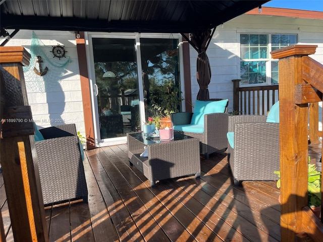 deck featuring outdoor lounge area