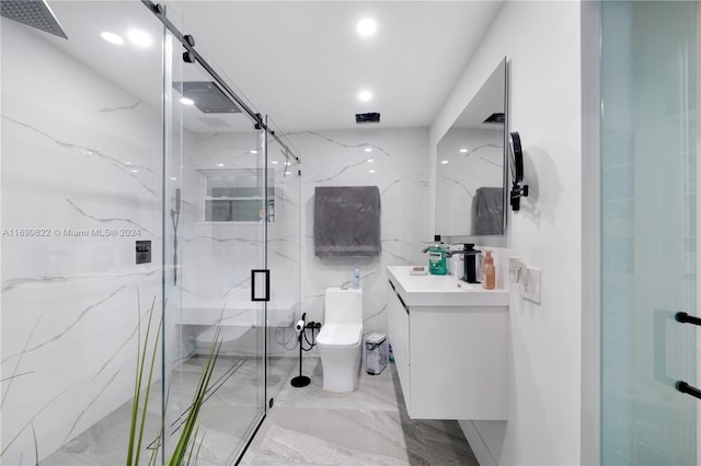 bathroom with vanity, toilet, and an enclosed shower