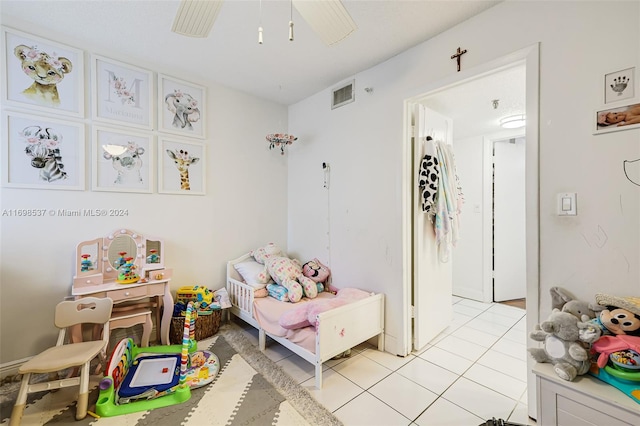 bedroom featuring light tile patterned flooring