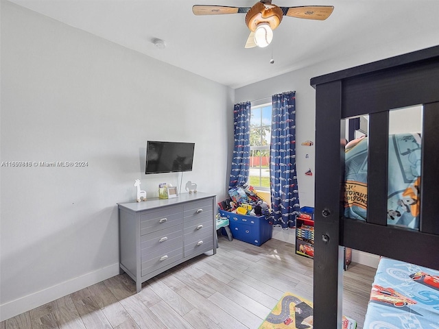 recreation room with light hardwood / wood-style flooring and ceiling fan