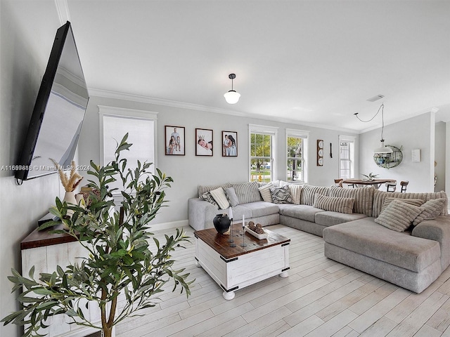 living room with crown molding and light wood-type flooring