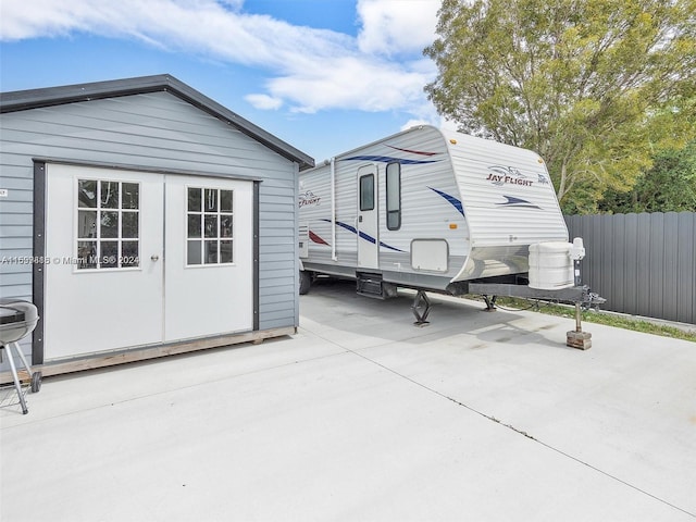 exterior space featuring a storage unit