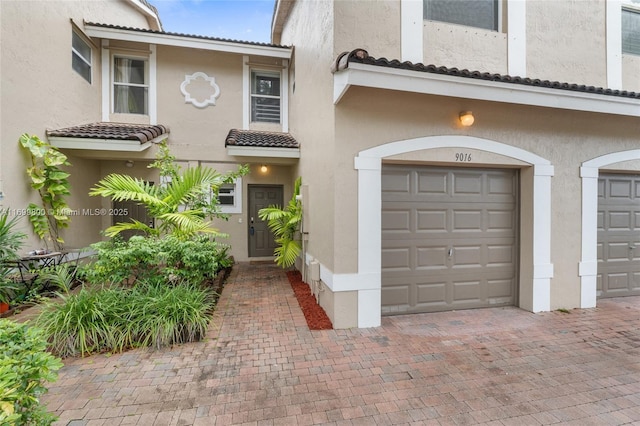 view of front of property featuring a garage