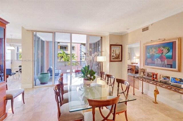 living room with a raised ceiling and crown molding