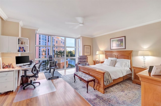 bedroom with ornamental molding, light wood-type flooring, access to outside, and ceiling fan