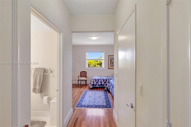 bedroom with hardwood / wood-style flooring