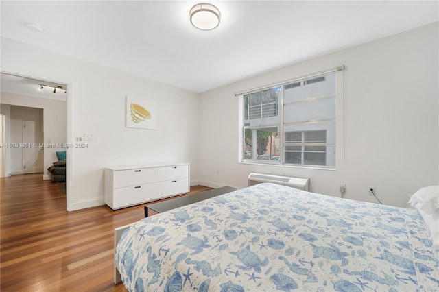 420 15th St Unit 105, Miami Beach, FL 33139 - bedroom featuring wood finished floors and baseboards