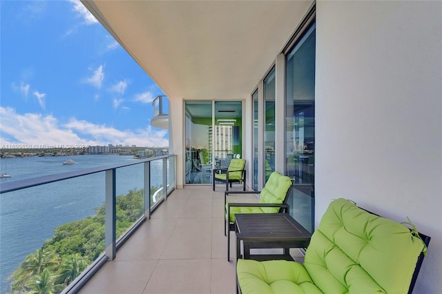 balcony featuring a water view