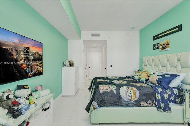 bedroom with light tile patterned flooring