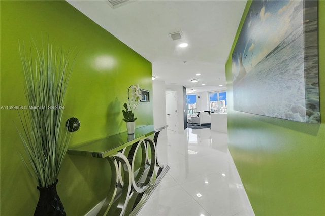 corridor with light tile patterned flooring