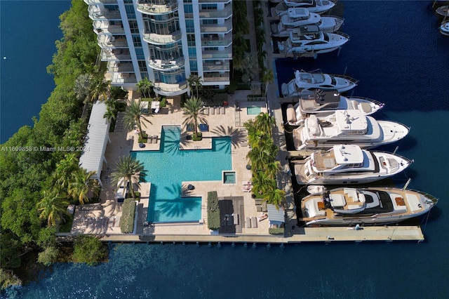 birds eye view of property featuring a water view