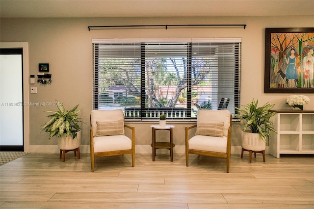 living area featuring light hardwood / wood-style flooring