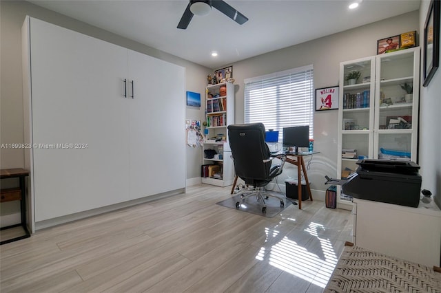 home office featuring ceiling fan and light wood-type flooring