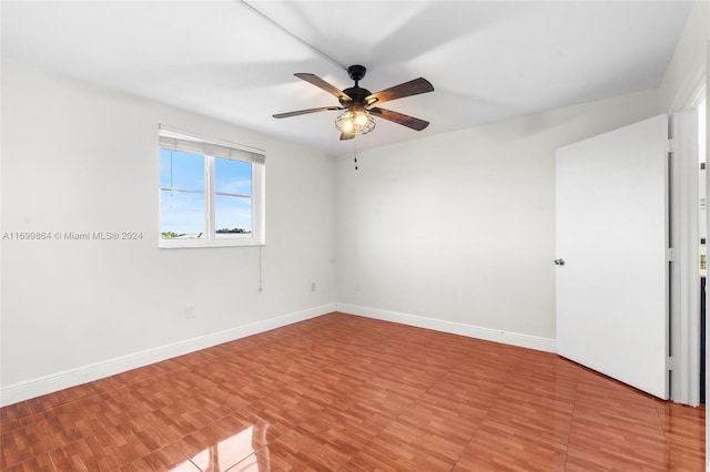 spare room with ceiling fan