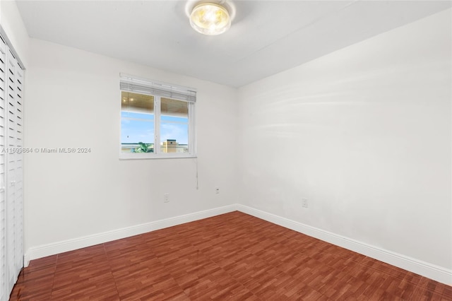 empty room featuring hardwood / wood-style floors