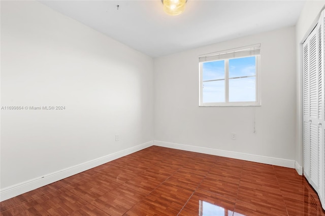 spare room featuring hardwood / wood-style flooring